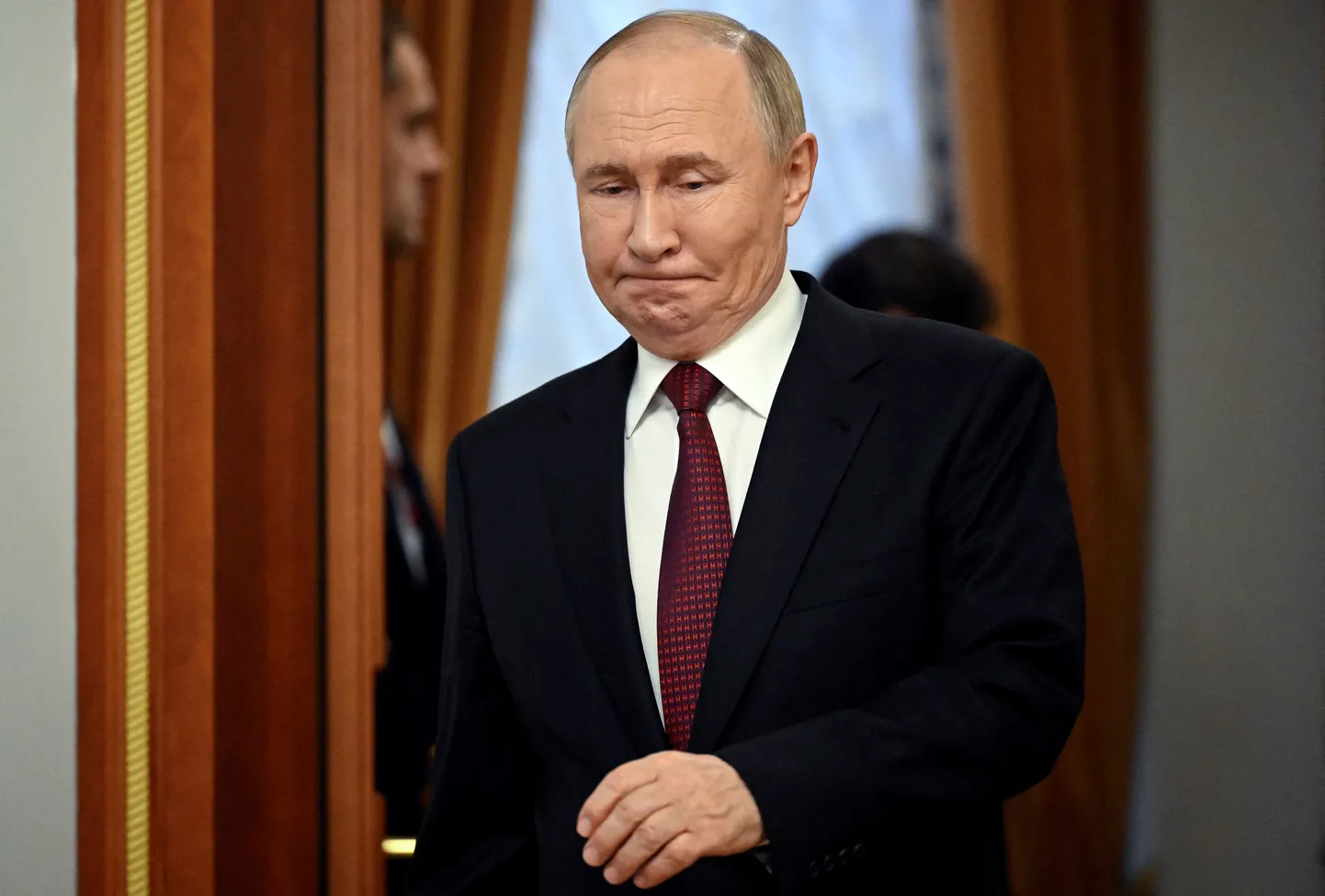 Путин