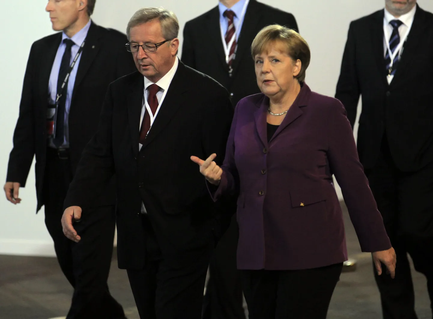 Jean-Claude Juncker ja Angela Merkel.