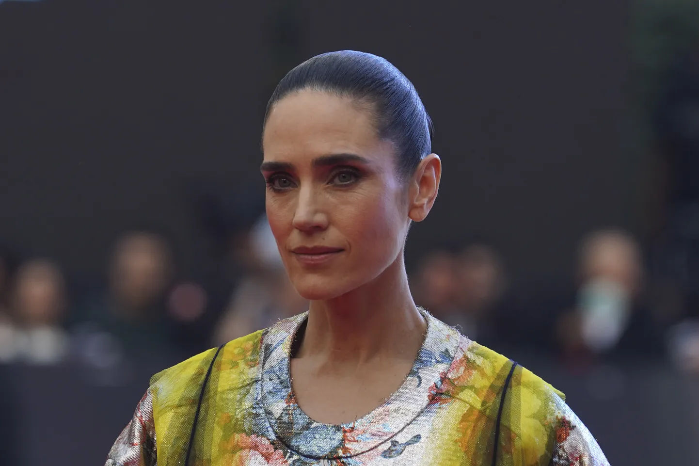 Jennifer Connelly poses for photos during a red carpet event for the movie “Top Gun: Maverick”, in Mexico City, Friday, May 6, 2022.  (AP Photo/Marco Ugarte)